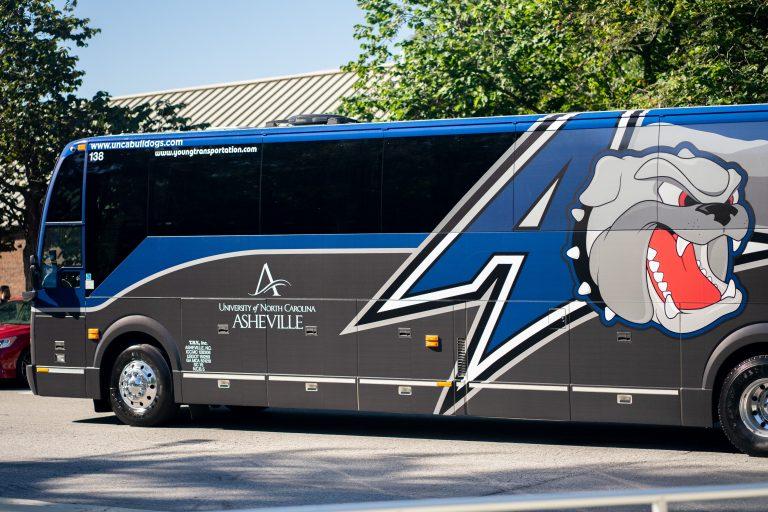 Athletic department introduces new branded bus for team travel The