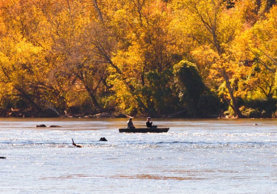 There are no laws prohibiting Progress Energy and other companies from dumping toxins and waste into the French Broad River, where many spend time enjoying the outdoors. Photo by Ricky Emmons.