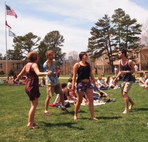 Photo by Ricky Emmons - Photography Editor Students enjoy the warm weather while dancing to Beatles music on the quad.