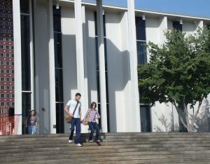 Photo by Tina Scruggs - Staff Writer Asheville resident Nick Conte and his daughter Molly travel to the Ramsey Library on Sunday afternoon.