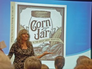 Photo by Tina Scruggs Photo by Tina Scruggs - Staff Writer Tracy Rizzo introduces Dan Pierce’s new book: “Corn from a Jar: Moonshining in the Great Smoky Mountains.