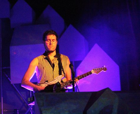 David Satori, member of Beats Antique, plays guitar during Thursday nights performance at the Orange Peel. 