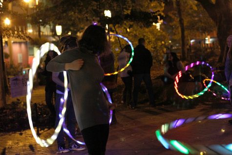 Light up hoola hoops attracted many participants and spectators at Pritchard Park during the Mountain Oasis Festival on Saturday Night.
