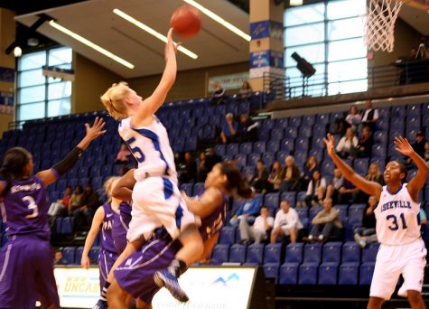 Junior Jeannie Bucker leaps for the basket at the womens game against Furman last Saturday. 