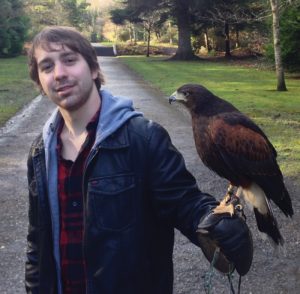 Photo contributed by Ted Kendrick Senior Ted Kendrick holds a harris hawk named Samhradh at the falconry school at Ashford Castle in Cong, Ireland, last spring.