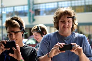 Destin Lurch, 17, and Caleb Wiseor, 18, from Boone listen as software turns  their brainwaves to music at Moogfest photo by Brian Vu