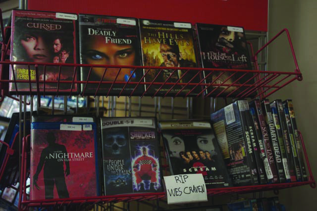 (Photo by Johnny Condon, staff photographer) Orbit DVD creates a display for the recent passing of Wes Craven.