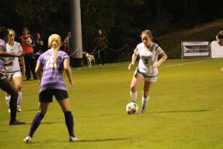 Jessica Dooley maneuvers the ball up the field in the game against High Point on Wednesday (Photo by Chris Jones, Sports Staff Writer)