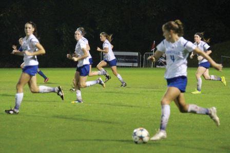 Caroline Houser pushes forward against Presbyterian. (Photo by Chris Jones, sports writer)