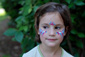 A young girl with attends the Montford Arts Festival. Photo by Flickr user Stupid Mommy