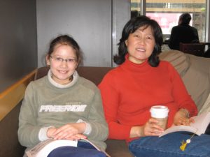 R. Gray and their mom relax at a coffee shop in Seoul. Photo courtesy of Yunhee Gray.