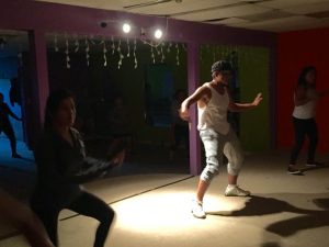 Salvador Chavez instructs and motivates his students during Zumba class. Photo by Karen Lopez.