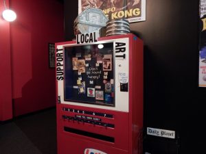 The refurbished Lance snack machine that sells local art and a movie zine. Photo by Sarah Forshey.