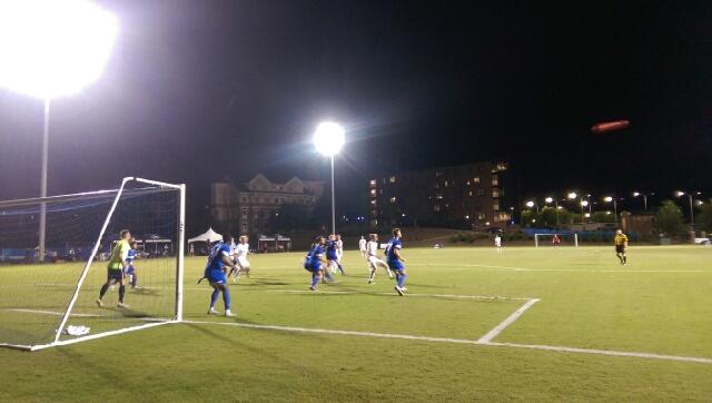 The UNCA Bulldogs set up for a corner kick against Longwood. Photo by Charlie Heard