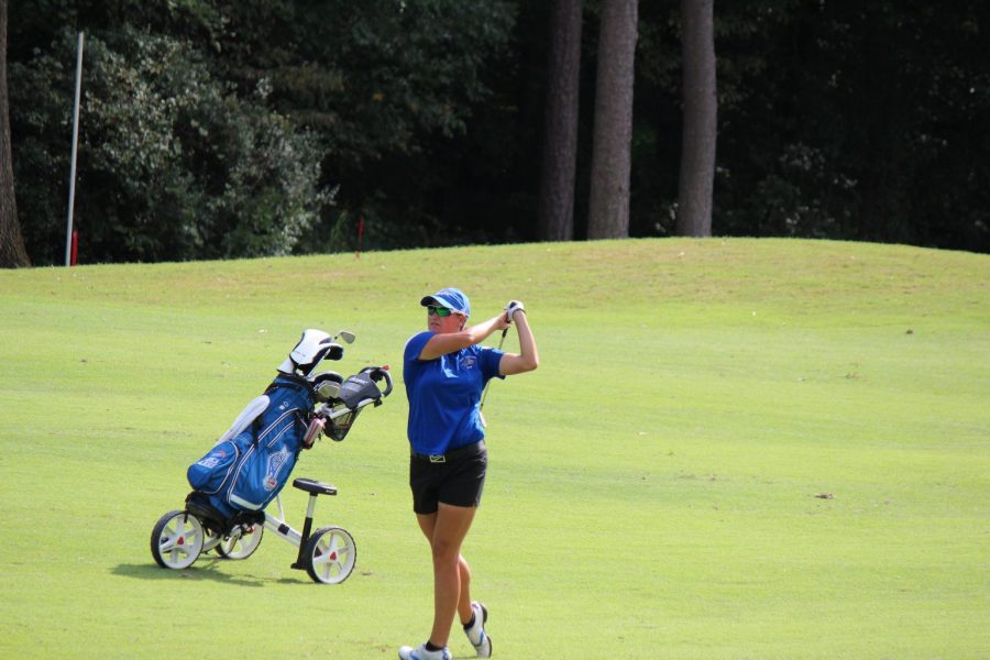 Erica Oldberding follows through on her swing at the Greensboro Invitational. Photo by Charles Heard.