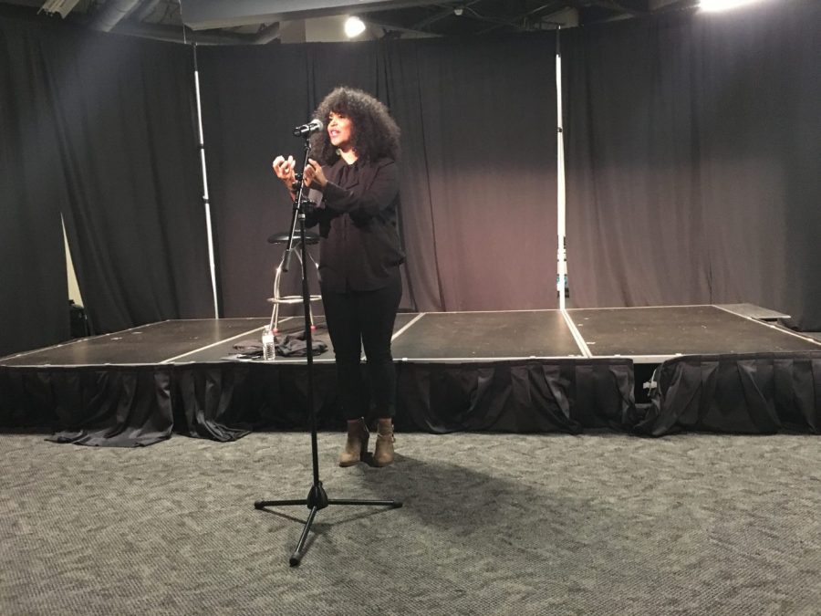 Elizabeth Acevedo delivers a compelling spoken word performance. Photo by Karrigan Monk.
