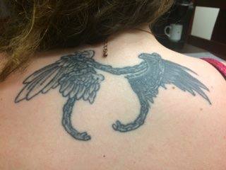 Emma Rogers has a pair of wings on her back: one angel wing and one raven wing. Photo courtesy Emma Rogers. 