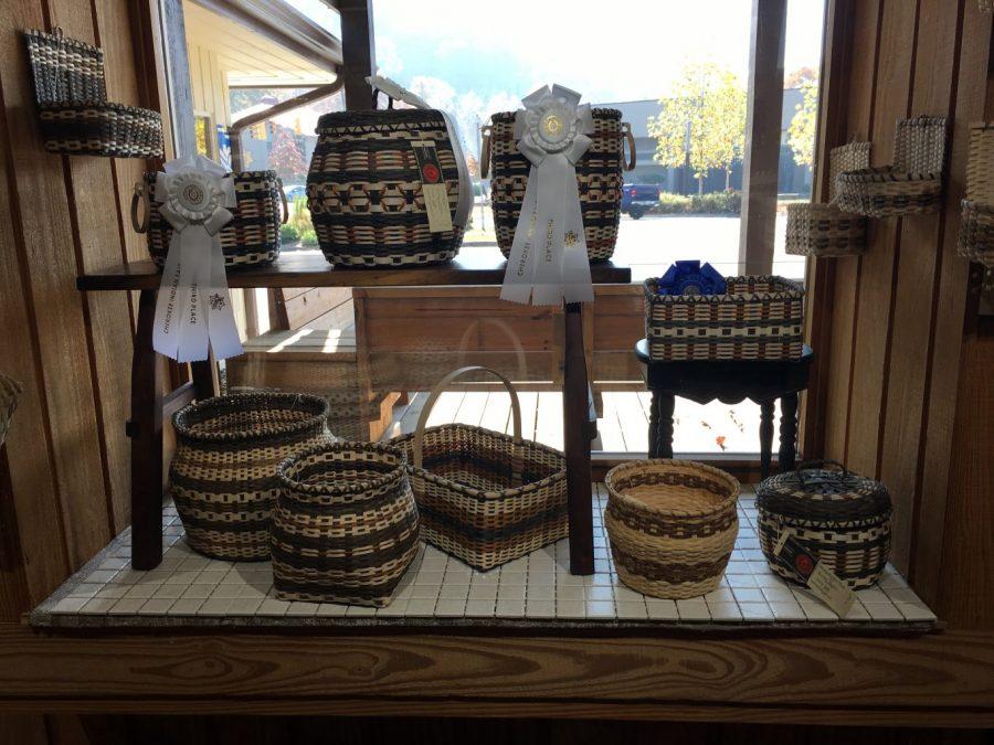 Handmade baskets on display in the window of the Qualla Arts and Crafts Mutual.
Photo by Karrigan Monk.