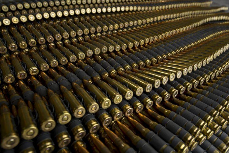 Belts of 7.62 mm ammunition are prepared for distribution to international competitors before an international machine gun shooting match at the 2012 Australian Army Skill at Arms Meeting (AASAM) in Puckapunyal, Australia, May 9, 2012. AASAM was an international marksmanship competition that included 16 countries. (U.S. Air Force photo by Tech. Sgt. Michael Holzworth/Released)