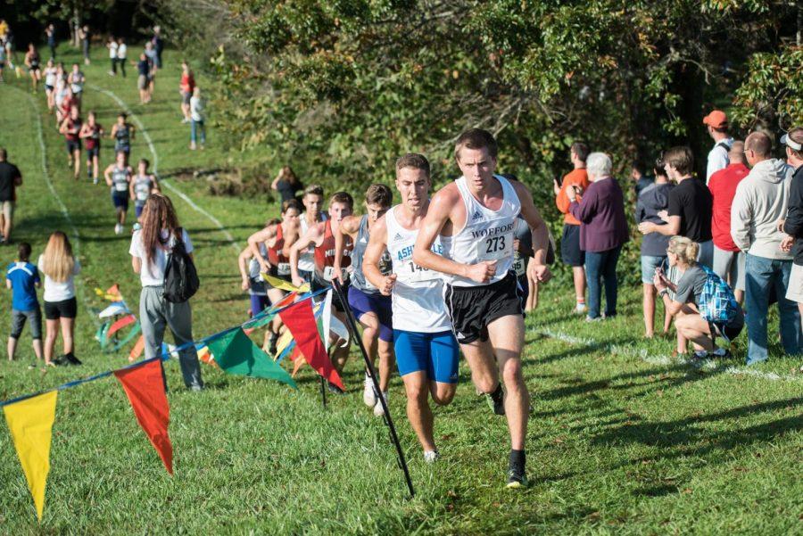 Sophomore Hunter Newman races for the mens cross country team. Photo by Adrian Etheridge 