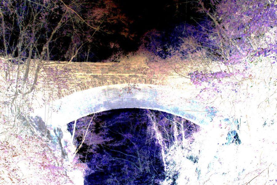 Helens Bridge is a famous spot for ghost enthusiasts in Asheville. Photo illustration by Dusty Albinger and Bryce Alberghini.