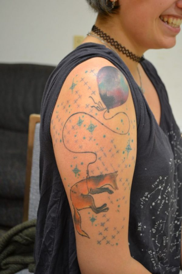 Elizabeth Webb calls this piece her wanderlust tattoo. Photo by Logan Todd
