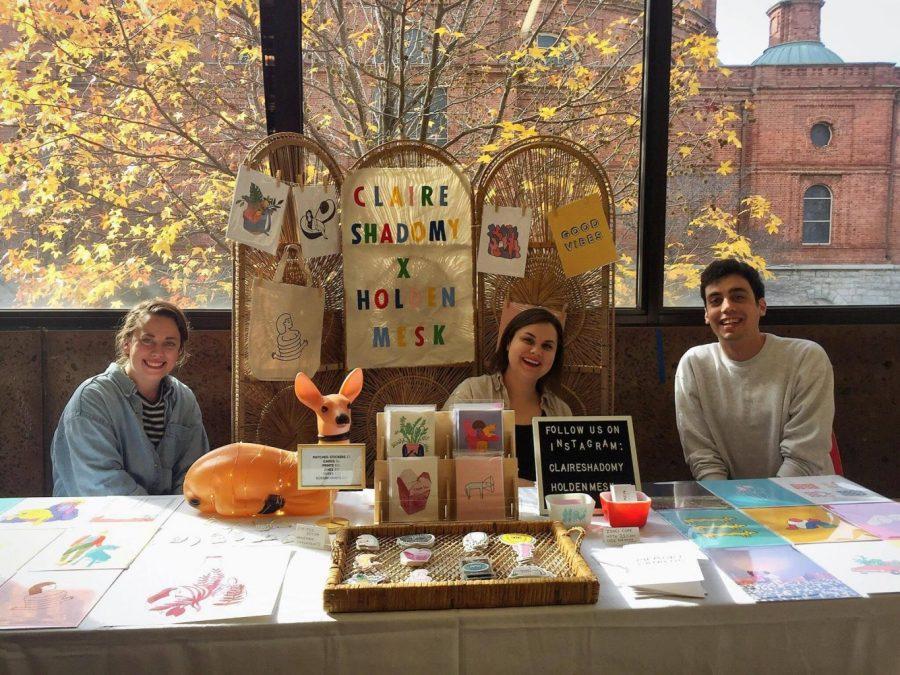 Claire Shadomy, Maddy Swims and Holden Mesk, all UNCA alumni, pose for a photo at Shadomy and Mesks booth at the biannual Big Crafty festival. Photo courtesy of Holden Mesk 