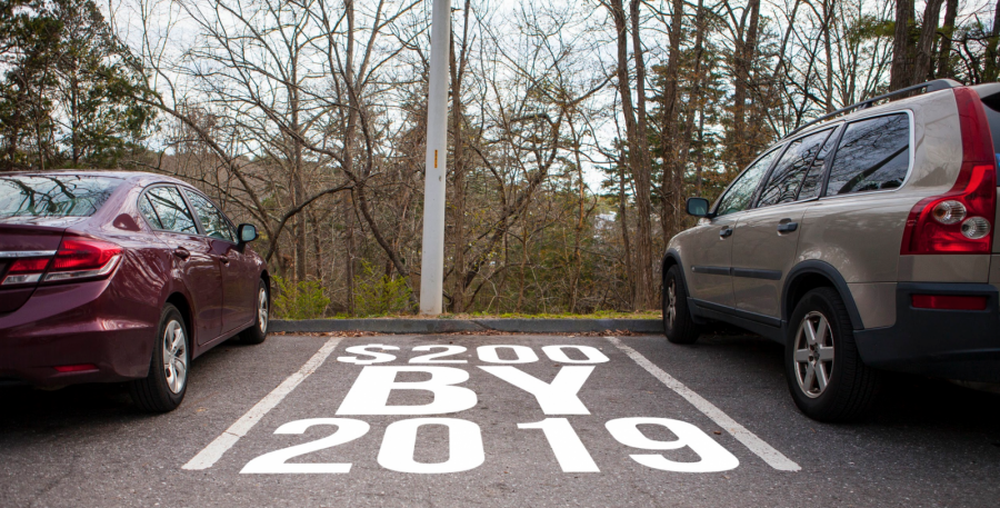 UNCA proposes raising parking fee in order to fund future parking projects. These fees will be discussed at the Proposed Parking Fee Forum April 4. Photo illustration by Nicholas Haseloff.