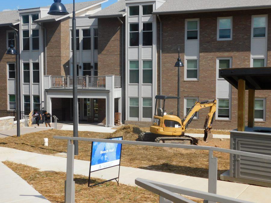 The Woods apartments are surrounded by construction equipment.
Photo by Maxx Harvey