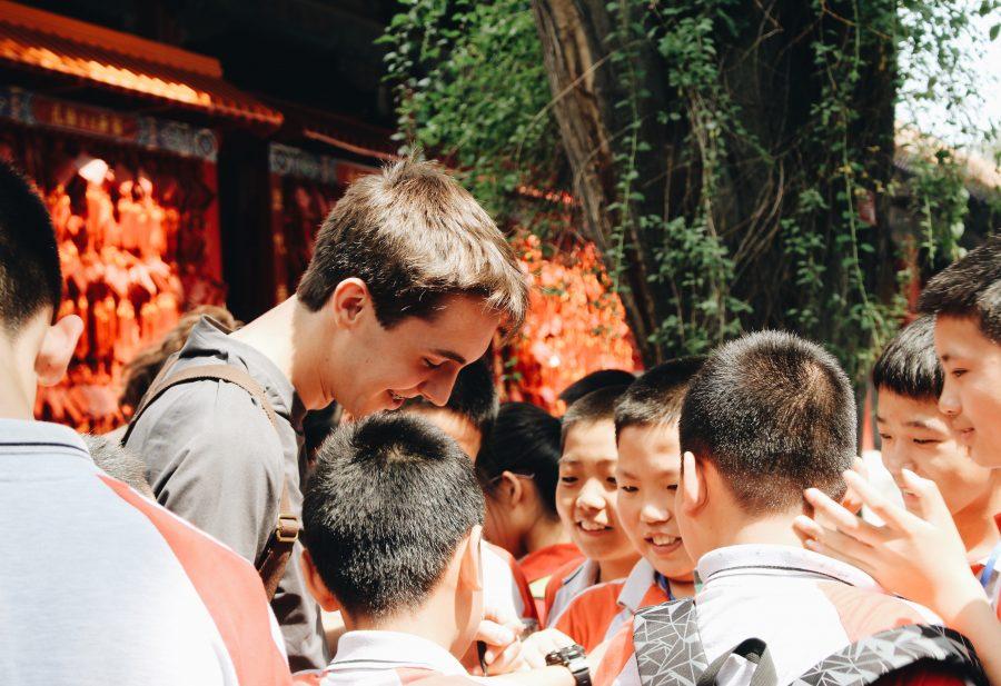 Paul Ruback visited Confucius hometown when a group of kids on a field trip ran up and invited him to sing. 