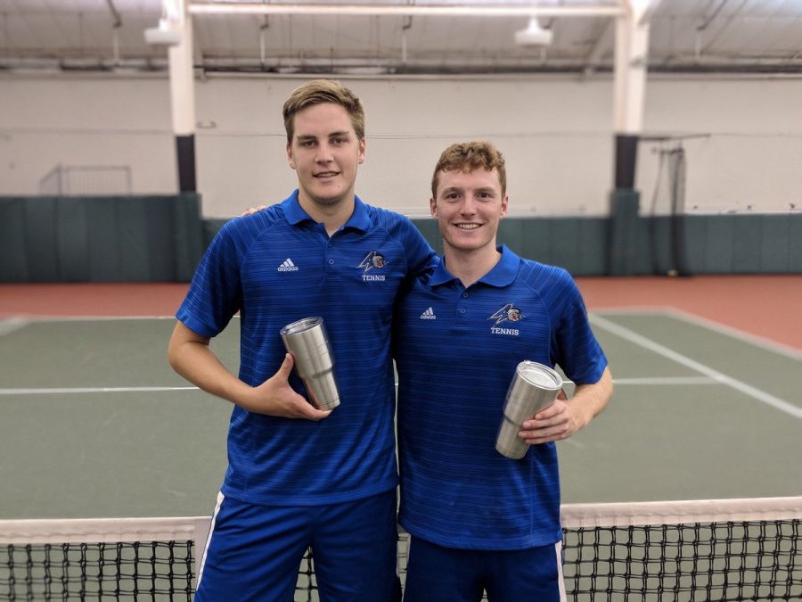 Henry Patten, left, and Oli Nolan pose for a photo after winning doubles at the Southern Intercollegiate Championships. Photo courtesy of the Big South Conference and UNC Asheville 