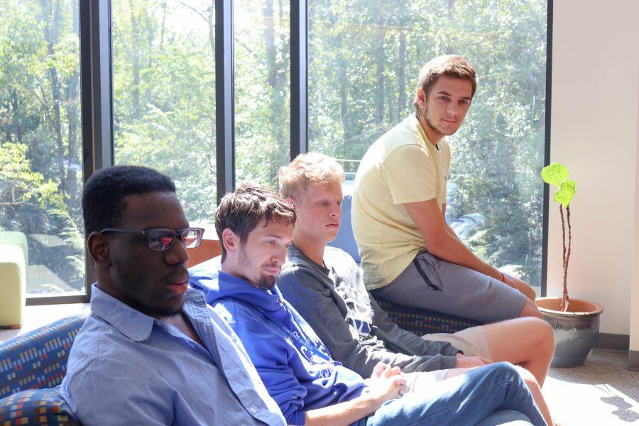 UNCW students, Lanre Badmus, Jay Parrack, Eddy Cornish and Teo Buhler share their experience of having to evacuate to UNCA due to Hurricane Florence. Photo by Camille Nevarez.