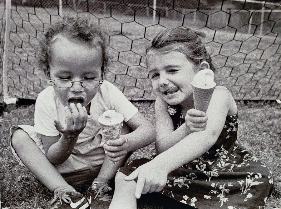 Lenoxx and Alicia Simonetti play and eat ice cream outdoors. Photo by Emily-Ann Trautman
