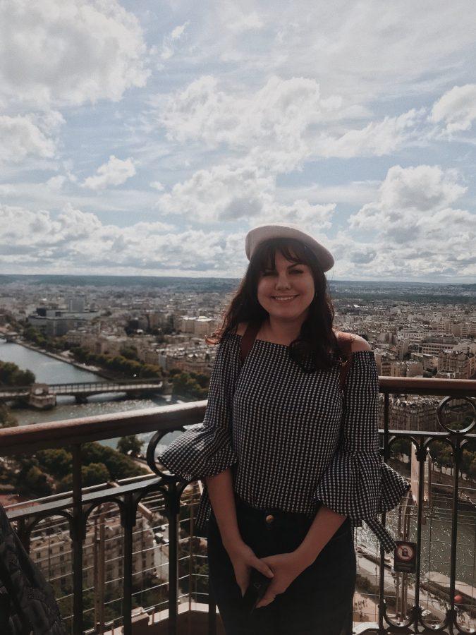 Leah Atkinson on top of the Eiffel Tower overlooking Paris, France. 