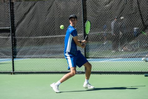 Photo by: Adrian Etheridge
Junior Charlie Morkel returns a serve in one 16 singles match wins last season.