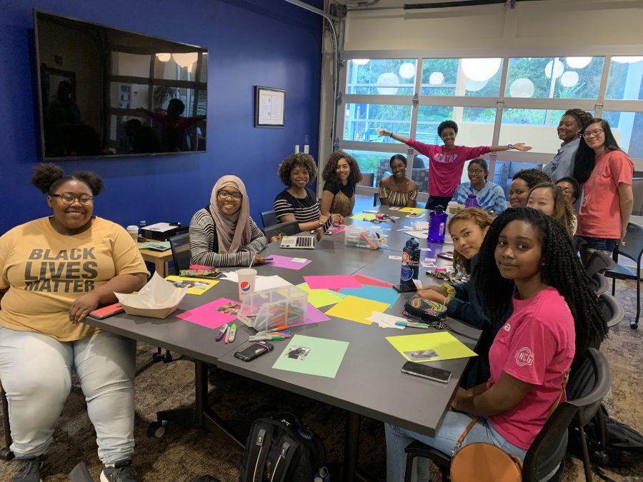  Photo by: Megan Pugh Sankofa members create affirmation cards during a Legacy meeting.