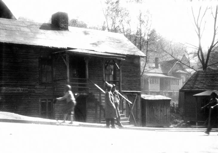 Photo Provided by Juanita Wilson; Pack Memorial Public Library, Asheville NC
View across a paved road in a Black section of Asheville in the vicinity of Valley Street(known of as a Negro Settlement) in 1949 