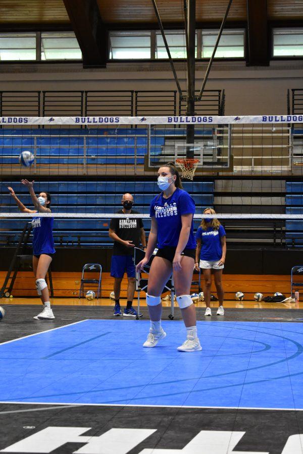 Photo By Lauren Callaghan UNC Asheville volleyball player Molly Hackett passes the ball to her teammates during practice one morning.
