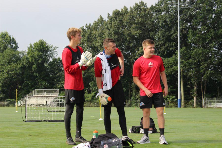Photo By Lindsey Ratliff UNC Asheville’s Men’s Soccer Goalkeepers Ian McGill, Grant Stidham and Nate Holladay hanging out after goalkeeper training on the Intramurals field. 