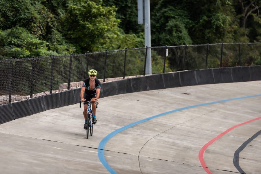 Cyclist races quickly around the track at Carrier Park. Photo by Brandon Buckles