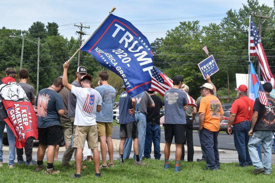 Trump supporters gathered last month in Mills River to watch the presidential motorcade pass through on route to the Republican National Convention in Charlotte.