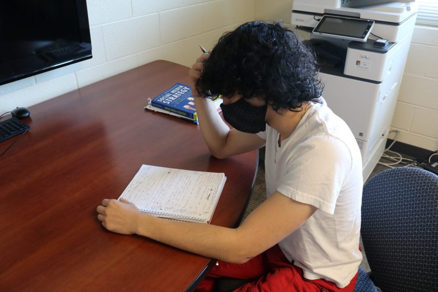 Photo by Xander Lord
  3rd Year UNC Asheville Student Adam Wan trying to study for an upcoming test.