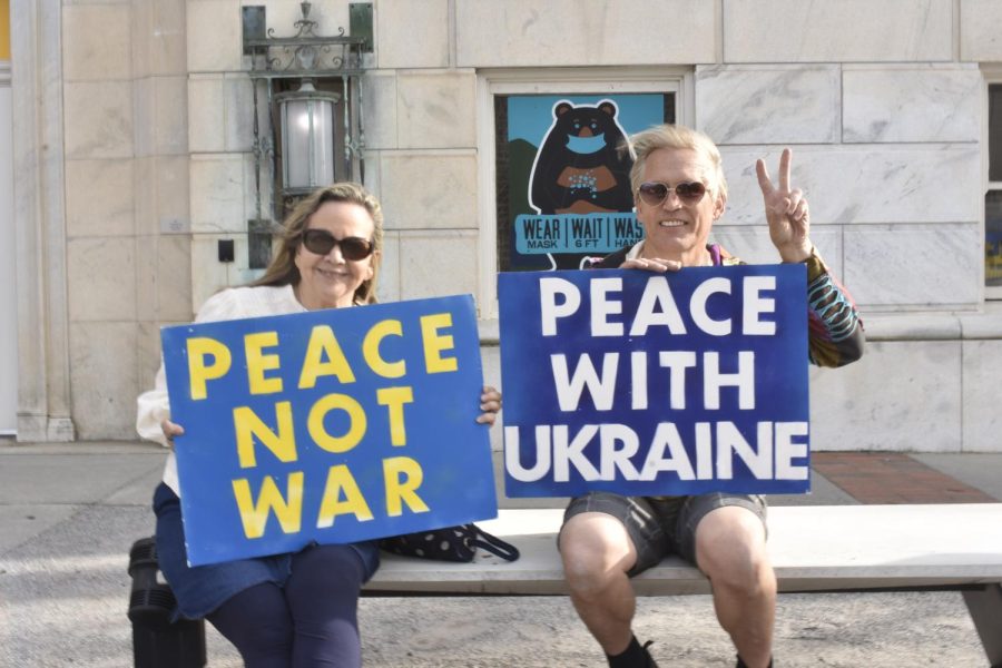 Lisa Wilcocks and rally organizer William Najger showing support for Ukraine.