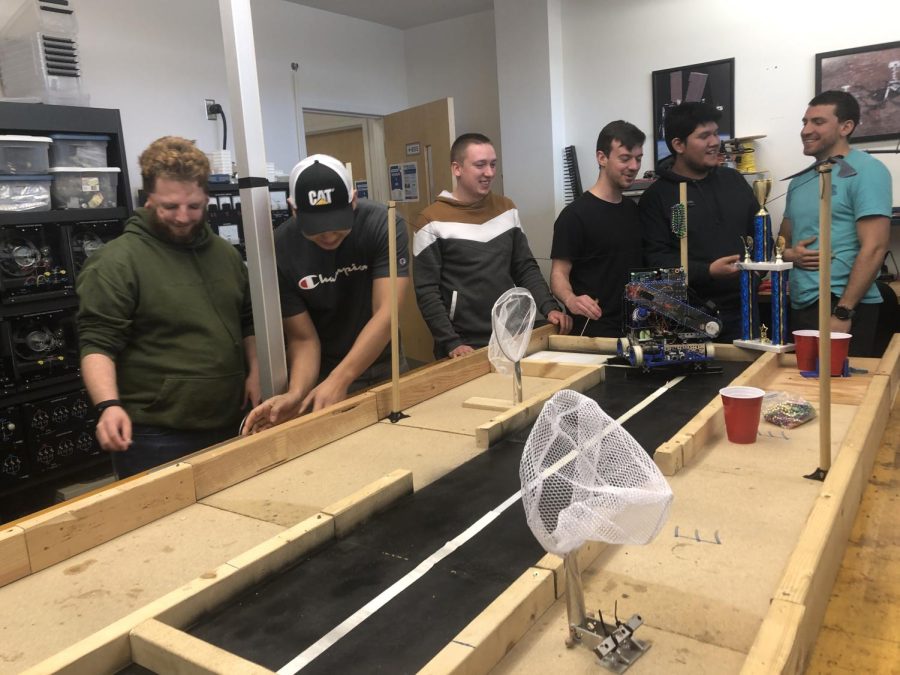 Pictured left to right, Ryan Stacks, Gustavo Melo-Perez, Hunter Horan, Steven Anderson, Luis Martinez and Robert Brenneman are part of the UNC Asheville robotics team.