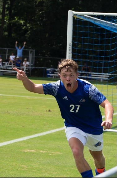 UNCA Men’s Soccer Player Conor Behan celebrates a goal. 