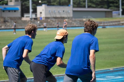 UNC Asheville mens cross country juniors and distance runners, Adam Hessler, Jackson Core and Dylan Major line up to run.
