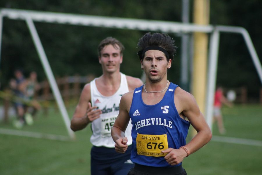 UNC Asheville mens cross country junior Jackson Core races to the finish at the Covered Bridge Open on Sept. 2.
