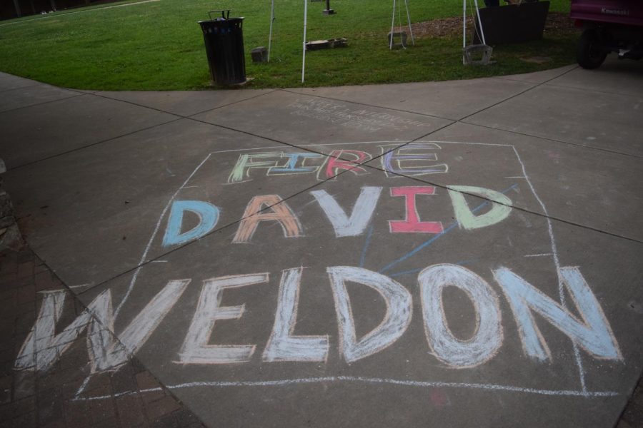 Sidewalk+chalk+protesting+David+Weldon%2C+the+director+of+emergency+management.+