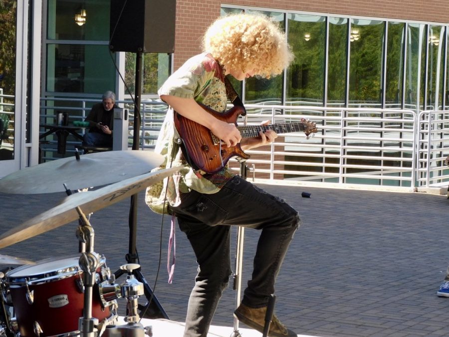 Isaac Hadden shreds guitar during a solo performance in one of the quartet’s final songs. 
