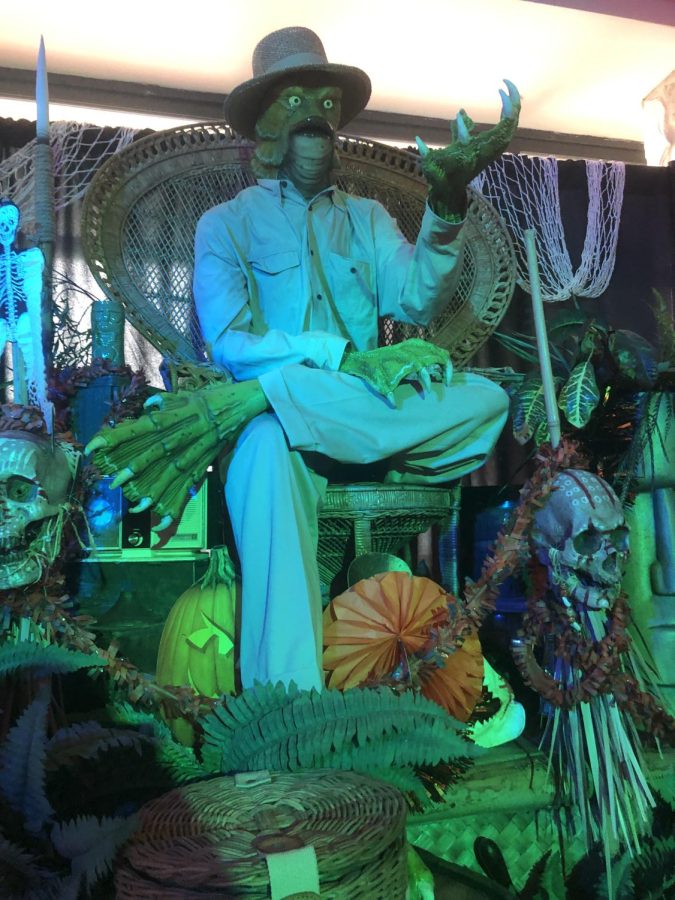 The Creature From the Black Lagoon relaxes as it welcomes travelers into the Dead Coconut, a lounge bar at Universal.
